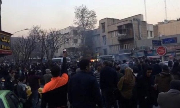 People protest in Tehran, Iran December 30, 2017 in this still image from a video obtained by REUTERS.
