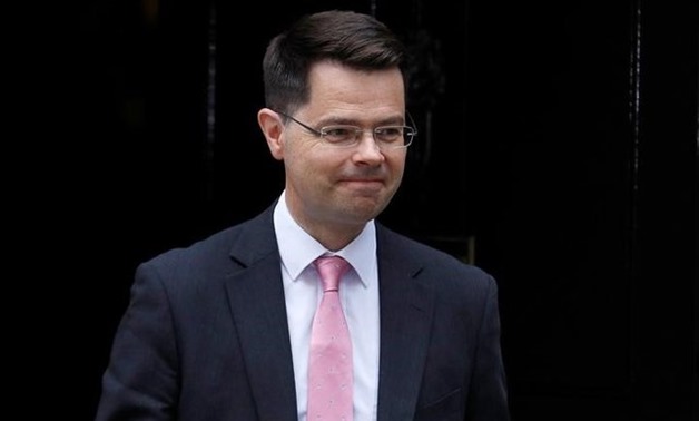 FILE PHOTO: Britain's Secretary of State for Northern Ireland, James Brokenshire leaves Downing Street, London, Britain July 11, 2017. REUTERS