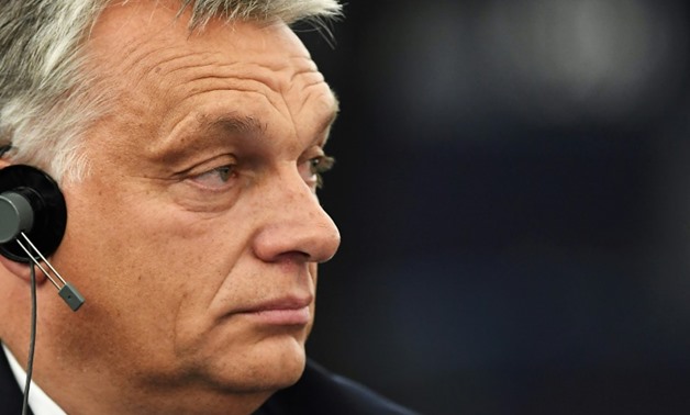 Hungarian Prime Minister Viktor Orban confronts his critics in the European Parliament on the eve of a vote to censure his right-wing populist government
