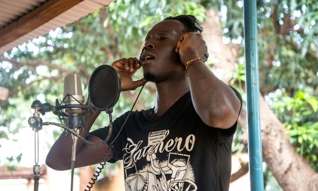 Jonathan Sougue, known as Johnyto, won a contest to record an album of songs inside the jail in Burkina Faso where he is serving a two-year term for being an accomplice to robbery.