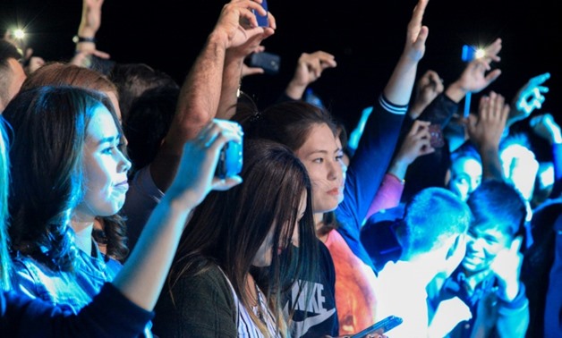 Revellers attend the Stihia electronic music festival in the town of Muynak.
