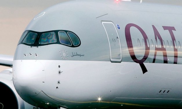 FILE - Qatar Airways said Tuesday, Sept. 18, 2018 that it suffered a loss of $69 million this year off revenue of $11.5 billion amid a boycott of Doha by four Arab nations. (AP Photo/Michael Probst, File)
