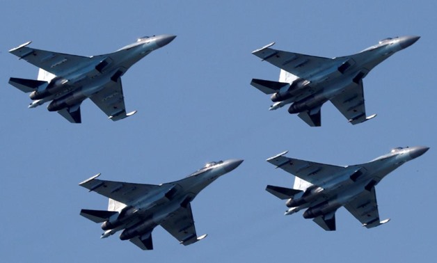 FILE PHOTO: Sukhoi Su-35 multi-role fighters of the Sokoly Rossii (Falcons of Russia) aerobatic team fly in formation during a demonstration flight at the MAKS 2017 air show in Zhukovsky, outside Moscow, Russia, July 21, 2017. REUTERS/Sergei Karpukhin/Fil