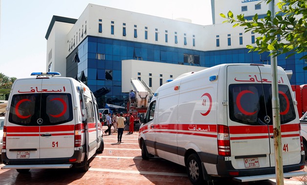 File photo - Ambulances are seen near the headquarters of Libyan state oil firm National Oil Corporation (NOC) after three masked persons attacked it in Tripoli, Libya September 10, 2018. REUTERS/Ismail Zitouny 