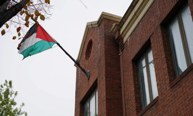 FILE - The flag of the PLO is seen above its offices in Washington - Mandel Ngan/AFP