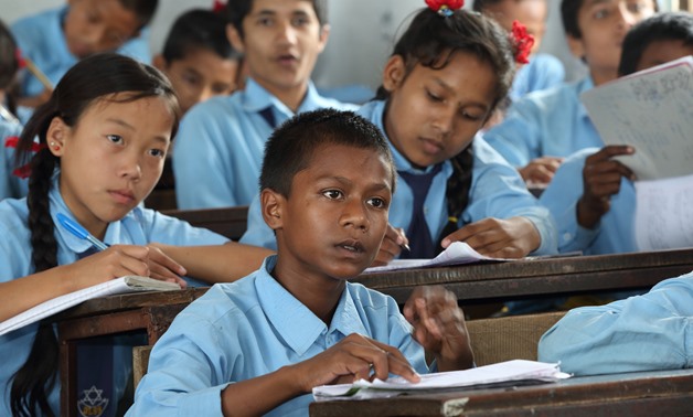 Students at Shree Dharmasthali Lower Secondary School, Pokhara, Nepal- CC via Flickr/ Department of Foreign Affairs