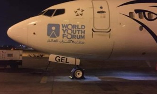FILE- EgyptAir painted the logo of the World Youth Forum on its planes