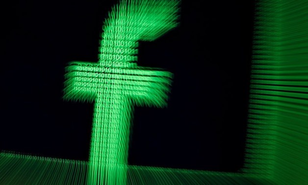 FILE PHOTO: A 3D-printed Facebook logo is seen in front of displayed binary digits in this illustration taken March 18, 2018. REUTERS/Dado Ruvic/Illustration/File Photo
