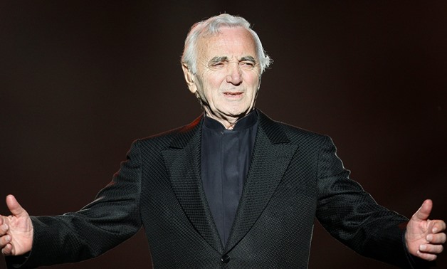 French singer Charles Aznavour performs during the Quebec Summer Festival July 6, 2008. REUTERS/Mathieu Belanger/File Photo
