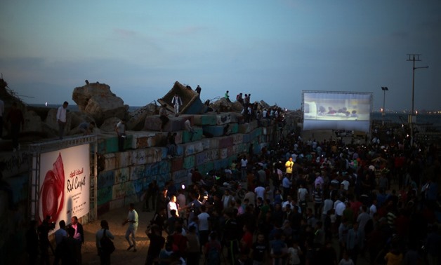 A film is screened during the third edition of the Red Carpet Film Festival, Gaza - AFP