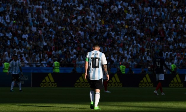 Game over: Argentina's Lionel Messi walking off the pitch after their 4-3 defeat to France at the World Cup.
AFP / FRANCK FIFE
