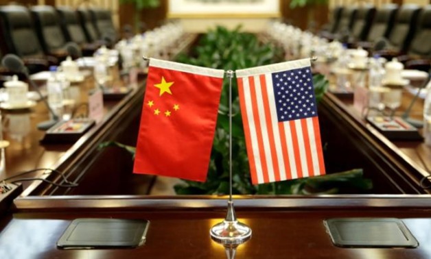 Flags of U.S. and China are placed for a meeting at the Ministry of Agriculture in Beijing, China, June 30, 2017. REUTERS/Jason Lee/File Photo - RC1A80FC9700