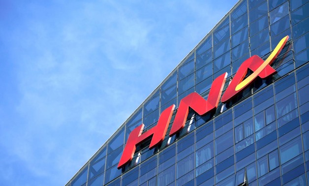 FILE PHOTO: A HNA Group logo is seen on the building of HNA Plaza in Beijing, China February 9, 2018. REUTERS/Jason Lee
