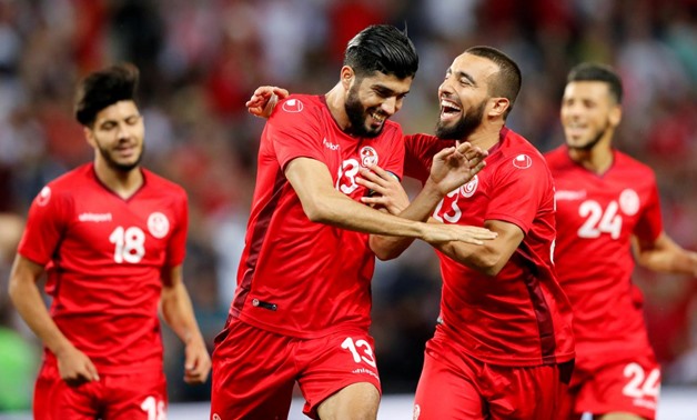 June 1, 2018 Tunisia's Ferjani Sassi celebrates scoring their second goal with team mates REUTERS/Denis Balibouse 