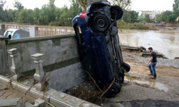 © AFP | Flash flooding in the medieval town of Trebes overturned cars, gutted streets and swamped hundreds of homes