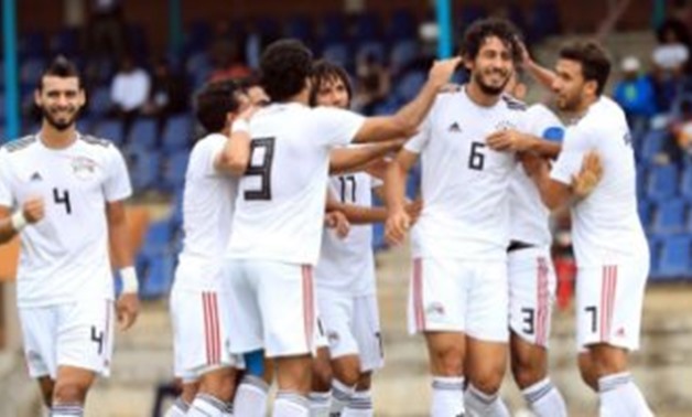 FILE - Egypt's players celebrate scoring the first goal against eSwatini