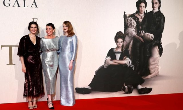 Actors Rachel Weisz, Olivia Colman and Emma Stone pose at the UK Premiere of The Favourite during the London Film Festival, in London, Britain October 18, 2018. REUTERS/Peter Nicholls.
