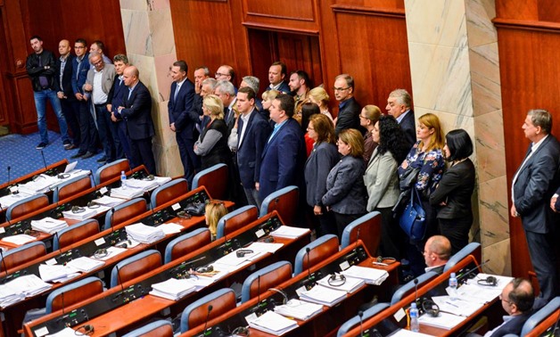 A group of opposition members of the VMRO-DPMNE stand to boycott the vote as the Macedonian parliament passed constitutional changes to allow the Balkan country to change its name to the Republic of North Macedonia, in Skopje, Macedonia, October 19, 2018.