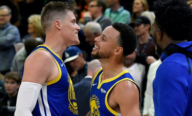 Sweden's Jonas Jerebko, left, of the Golden State Warriors celebrates his game-winning shot against his former Jazz teammates with Stephen Curry
GETTY IMAGES NORTH AMERICA/AFP / Gene Sweeney Jr.

