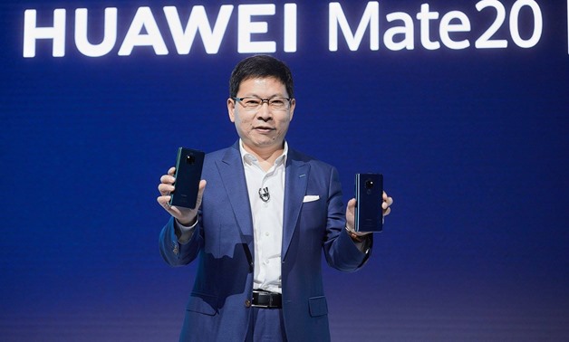 FILE- Huawei Consumer Business Group (BG) unveils the HUAWEI Mate 20 Series, one of the most highly anticipated smartphone series of the year