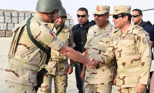Egyptian President Abdel Fattah al-Sisi greets troops in Sinai - Egyptian Presidency handout  
