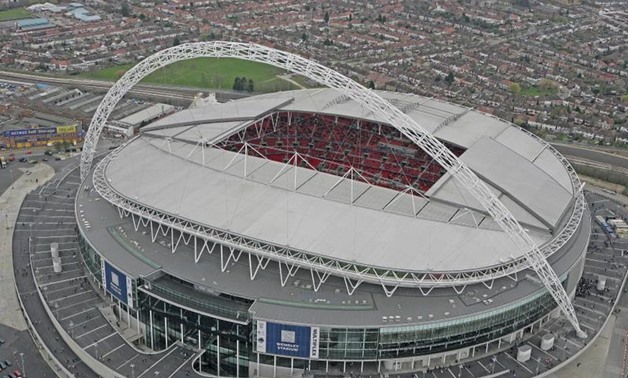 FILE PHOTO: An aerial view of Wembley Stadium is seen on its opening day in London, March 17, 2007. MANDATORY CREDIT: Action Images / WNSL REUTERS/Action Images/Pool
