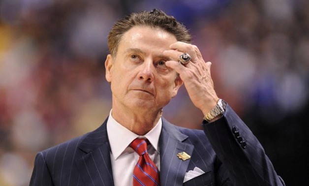 FILE PHOTO: Louisville Cardinals head coach Rick Pitino reacts against the Michigan Wolverines during the second half in the second round of the 2017 NCAA Tournament in Indianapolis, Indiana, U.S., March 19, 2017. Mandatory Credit: Thomas Joseph-USA TODAY