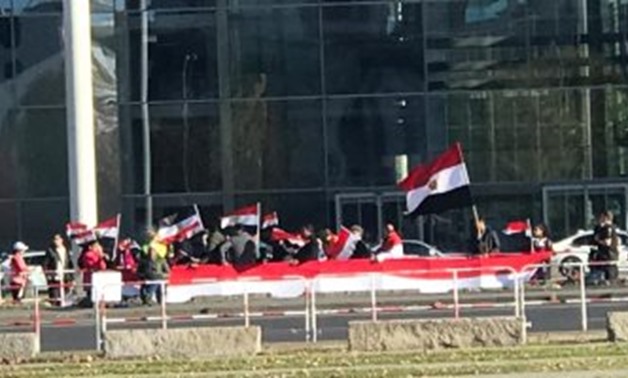 The Egyptian community in Berlin gathered Tuesday in front of the chancellery building in Berlin to welcome President Abdel Fatah al-Sisi during his visit - Press Photo
