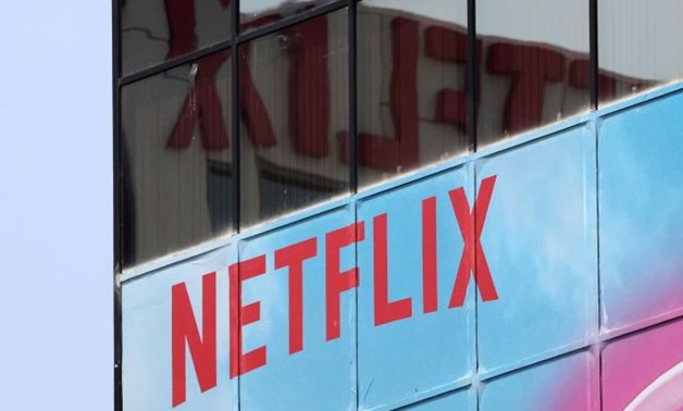 FILE PHOTO: The Netflix logo is seen on their office in Hollywood, Los Angeles, California, July 16, 2018. REUTERS/Lucy Nicholson/File Photo - RC1AB9591960.