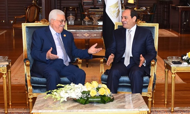 File- President Abdel Fatah al-Sisi (R) and his Palestinian counterpart Mahmoud Abbas (L) in Sharm El-Sheikh on Nov. 3, 2018- Press Photo