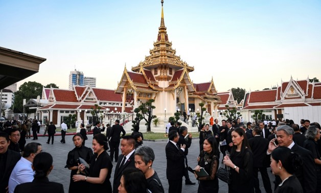 The week-long ceremony at the Wat Thepsirin Buddhist temple begins with three days of royally-sponsored bathing rites
