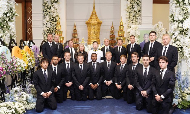 Aiyawatt Srivaddhanaprabha, poses with players and staff of Leicester City, during the funeral of his father, Vichai Srivaddhanaprabha's, late chairman of Leicester City Football Club in Bangkok, Thailand, November 4, 2018. King Power Handout via REUTERS 