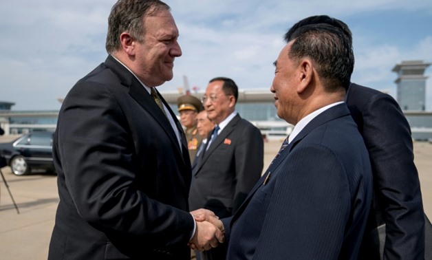 US Secretary of State Mike Pompeo and Kim Yong Chol (R), North Korea's number two, plan to meet in New York to discuss a possible second summit; seen here in a July 17, 2018 picture
