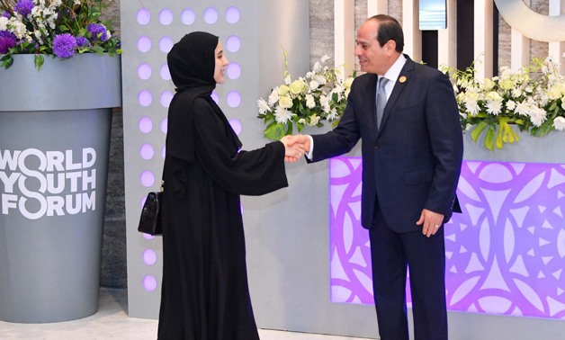Shamma Al Mazrui, the UAE’s Minister of youth, shaking hands with President Abdel Fatah al-Sisi during the 2nd edition of the World Youth Forum - Press Photo