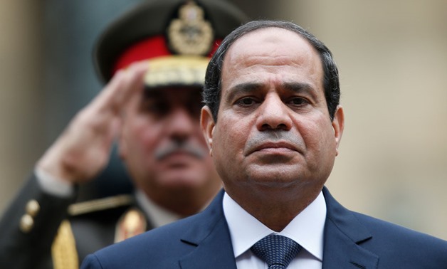 President Abdel Fattah al-Sisi says the military can deliver large, complicated projects faster than the private sector. Sisi is seen here during a visit to Paris in Nov. 2014. REUTERS