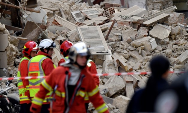 Neighbours said the two buildings collapsed in central Marseille in a matter of seconds
