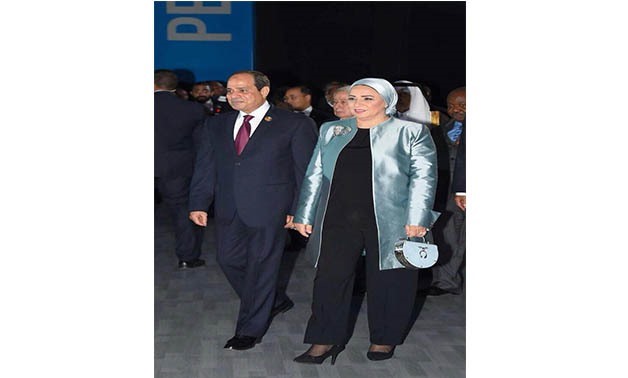 Egypt’s first lady Entesar al-Sisi was spotted at the opening ceremony of the World Youth Forum wearing Okhetin - Photo Via World Youth Forum Official Facebook page
