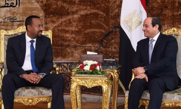 FILE- FILE - Egyptian President Abdel Fattah al-Sisi (R) meets with Ethiopian Prime Minister Abiy Ahmed (L) at the Ittihadiya presidential palace in Cairo, Egypt, June 10, 2018 – Reuters
