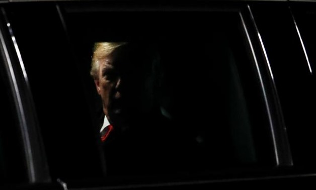 U.S. President Donald Trump is seen in the presidential limousine, known as "The Beast", as he arrives at Orly Airport near Paris to attend commemoration ceremonies for Armistice Day, 100 years after the end of the First World War, France, November 9, 201