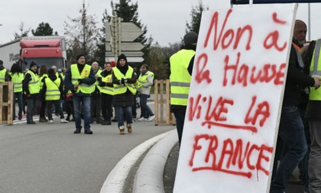 © Sébastien Bozon, AFP | 'Yellow vest' protesters block traffic in the easter French town of Dole on November 17, 2018
