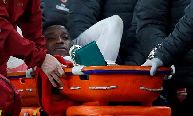 FILE PHOTO: Soccer Football - Europa League - Group Stage - Group E - Arsenal v Sporting CP - Emirates Stadium, London, Britain - November 8, 2018 Arsenal's Danny Welbeck leaves the pitch on a stretcher after sustaining an injury REUTERS/Eddie Keogh/File 