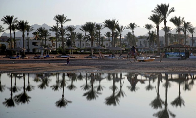 FILE PHOTO: Tourists are seen on a beach in the Aqaba Gulf on the Red Sea resort of Sharm el-Sheikh, Egypt July 12, 2018. REUTERS/Amr Abdallah Dalsh