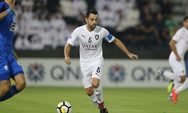 Xavi, who is with Al Sadd in Qatar, said this will be his last year as a player
AFP/File / KARIM JAAFAR
