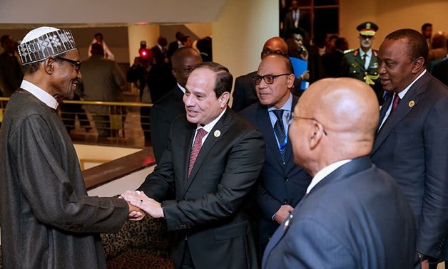PresidentMuhammadu Buhari exchanges pleasantries with Egyptian President Al- Sisi, South African President Jacob Zuma and Kenyan President