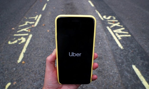 FILE PHOTO: The Uber application is seen on a mobile phone in London, Britain, September 14, 2018. REUTERS/Hannah McKay/File Photo

