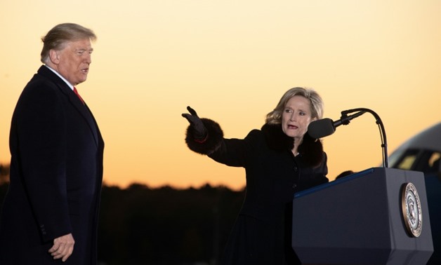 US President Donald Trump held a pair of 11th-hour campaign rallies in Mississippi to prop up Cindy Hyde-Smith's US Senate campaign
