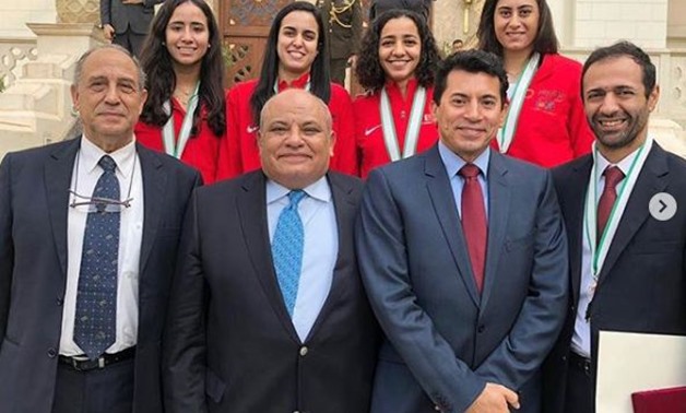 Minister and Squash board of directors and coach with Squash Women team members - Raneem el-Welily's instagram