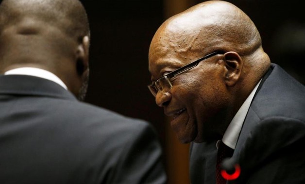 Former South African President Jacob Zuma speaks with counsel at court ahead of his court appearance in Pietermaritzburg, South Africa, November 30, 2018. REUTERS/Rogan Ward
