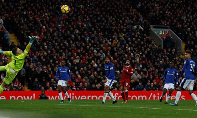 Soccer Football – Premier League – Liverpool vs Everton – Anfield, Liverpool, Britain – December 10, 2017, Liverpool's Mohamed Salah scores their first goal past Everton's Jordan Pickford Action Images – Reuters/Lee Smith