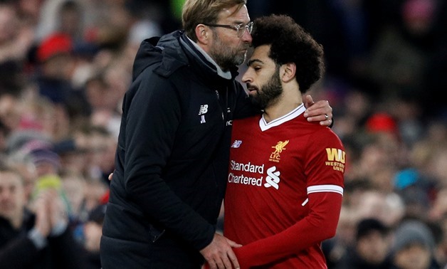 Soccer Football - Premier League - Liverpool vs Leicester City - Anfield, Liverpool, Britain - December 30, 2017 Liverpool manager Juergen Klopp congratulates Mohamed Salah as he is substituted REUTERS/Phil Noble 